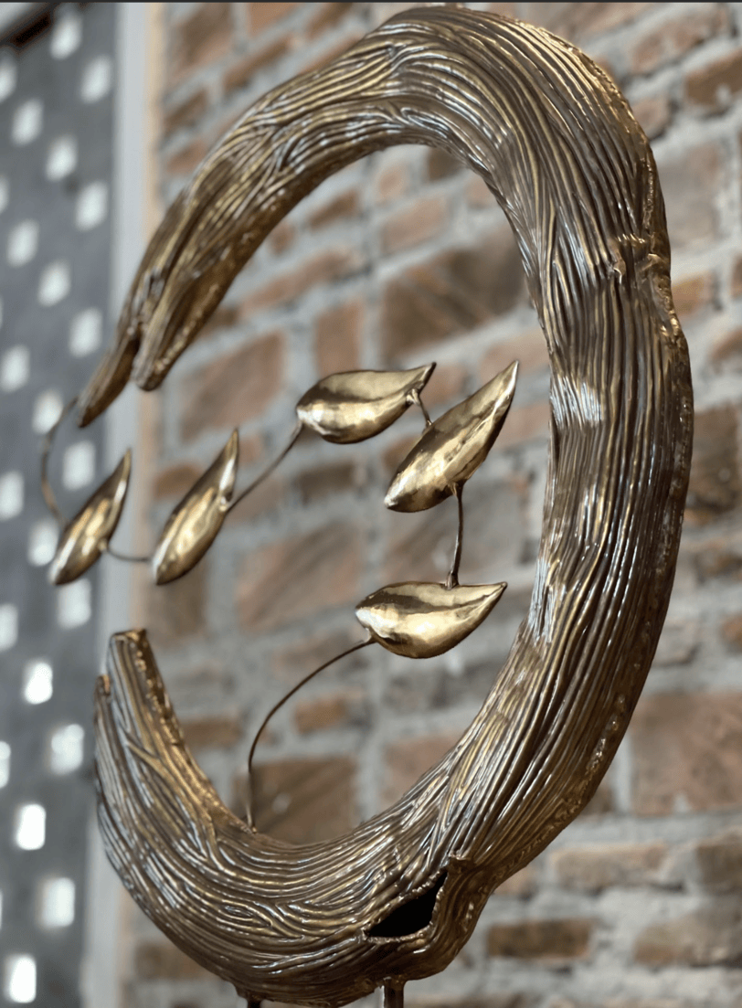 sculpture roemah tembaga